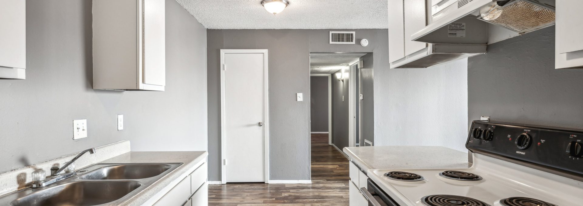 kitchen at The Alamo Village Apartments